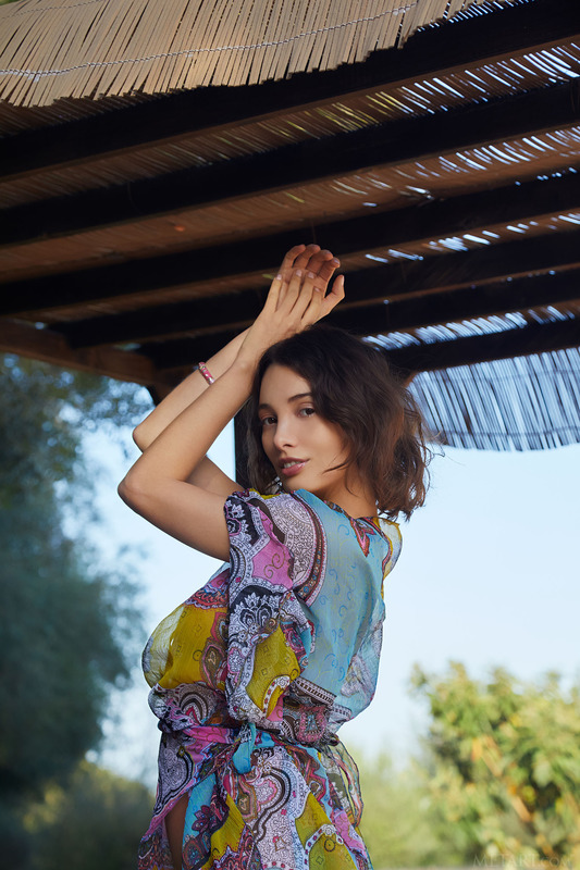 Stunning Hispanic brunette Calypso invites you to join her in the intimate shady space of the gazebo as she unveils her incredib 3