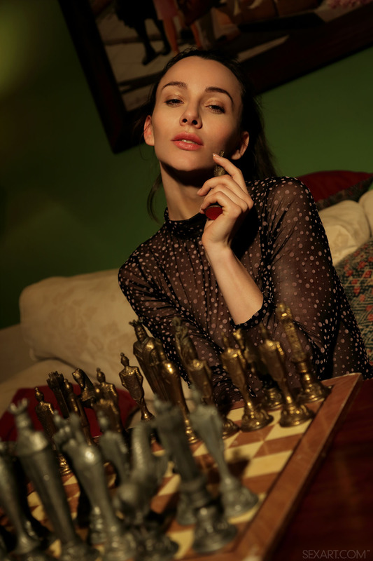 Sexy brunette Adel Morel always wins at chess. If the teasing glimpse of her permanently stiff nipples through her sheer bodysui 6